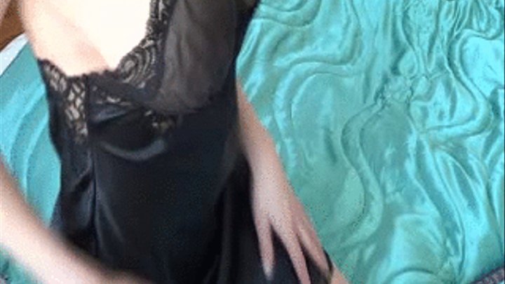 Mummy knows you're watching her - so she plays up to the camera..