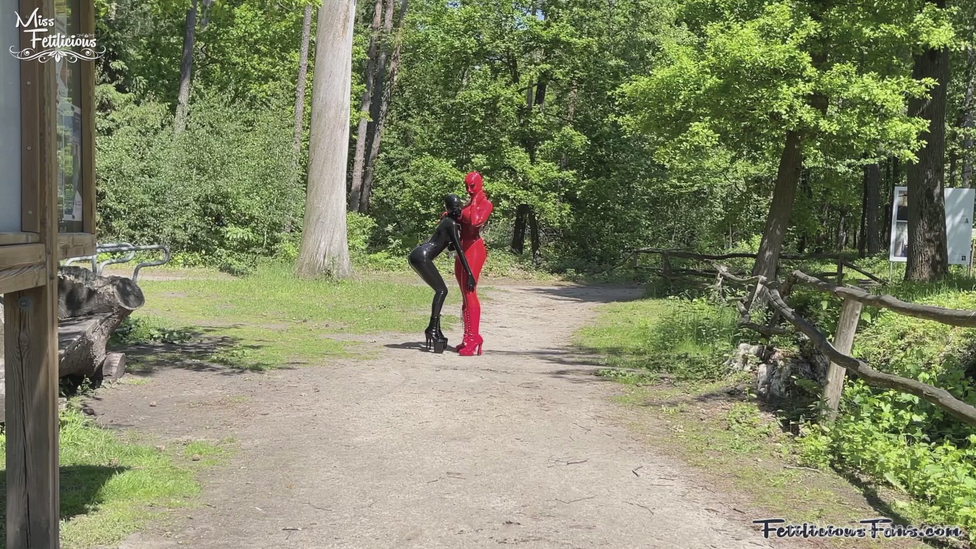 Bizarre latex dolls in public