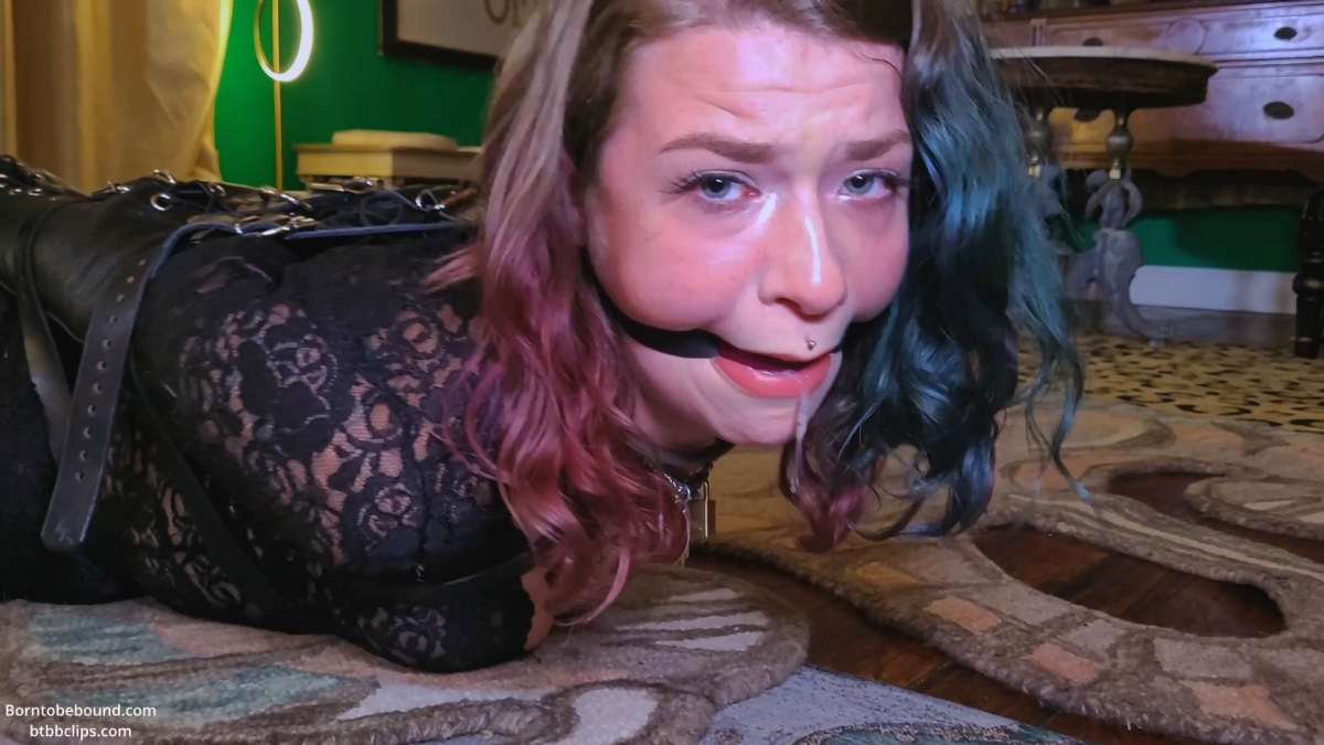Emily Addams in leather and lace working on her oral skills