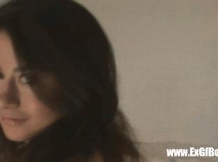 Brunette with pink dildo