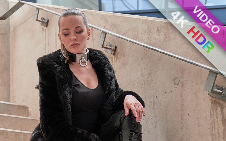 #393 Lady in black leather on tiptoes