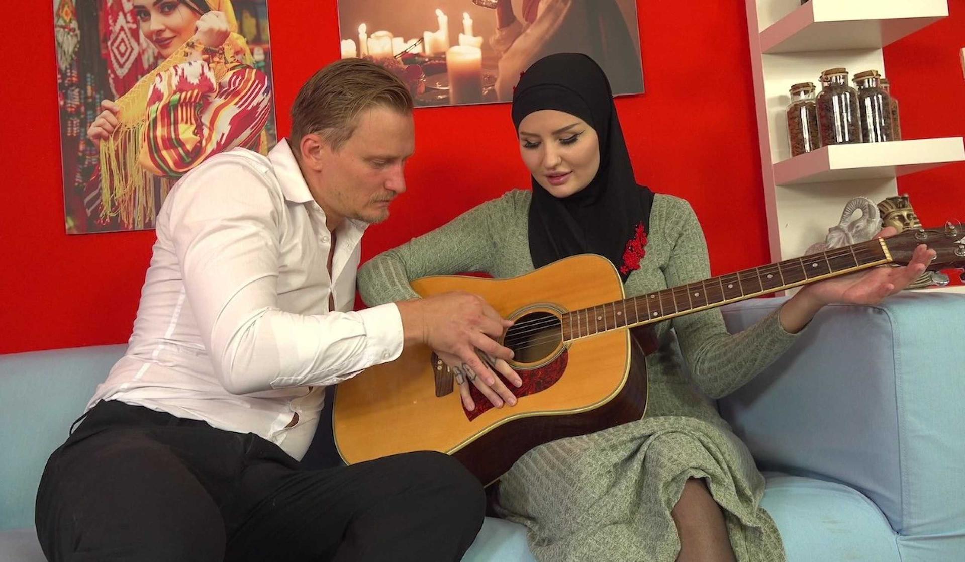 She's better at holding a dick than a guitar