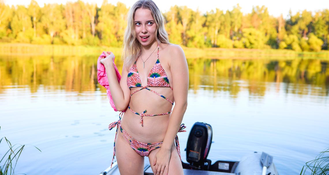 Alice Flore plays on the lake