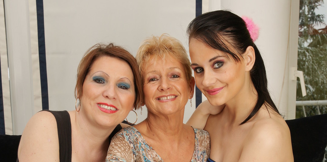 Old and young lesbians having a threesome