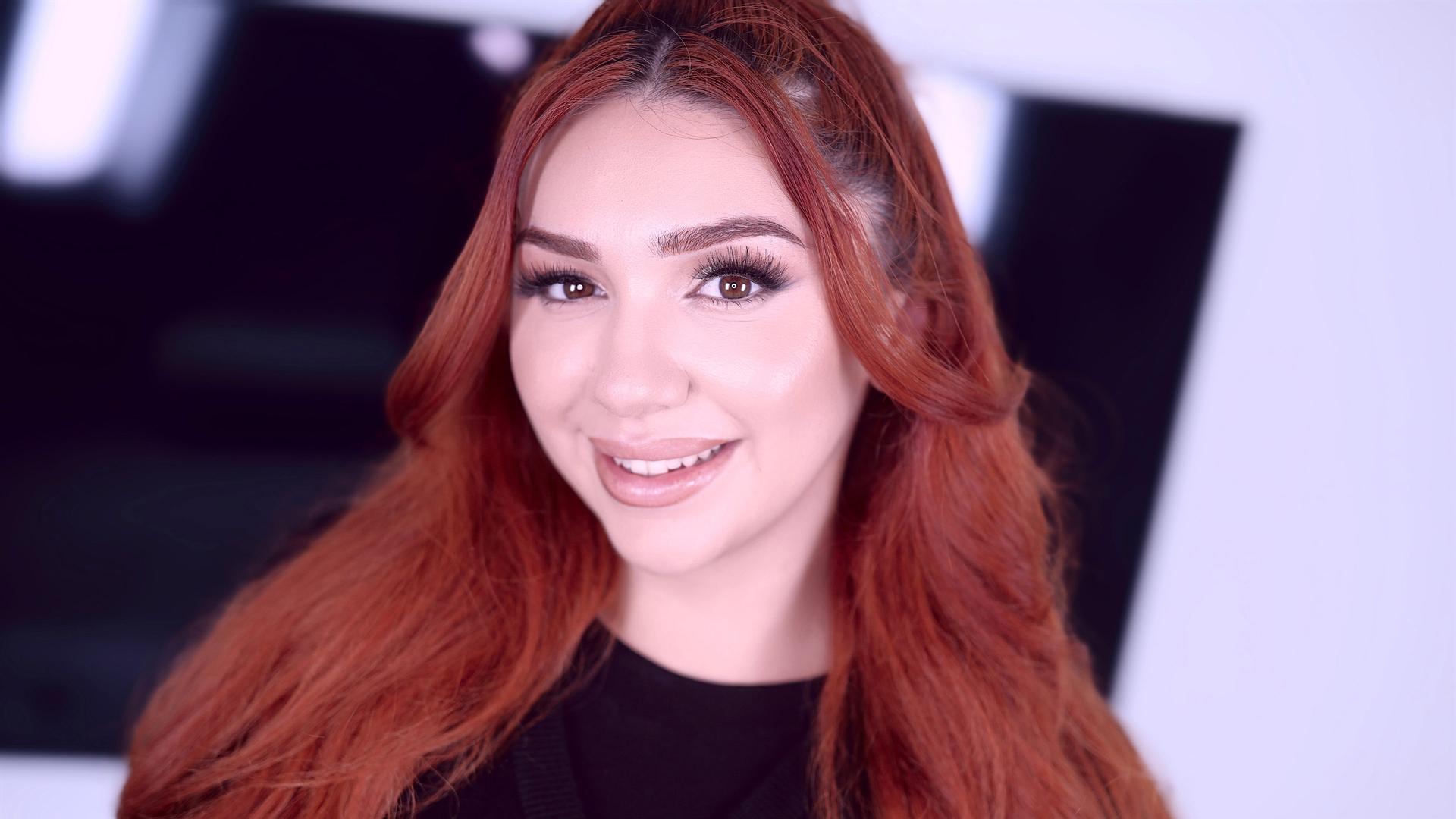 Sultry Redhead Charm: Cherie Gwendolyn Lights Up the Screen