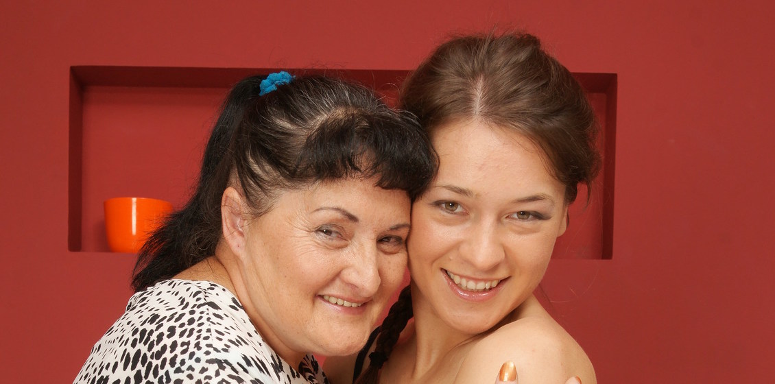 Mature lady licks hairy pussy from a young girl