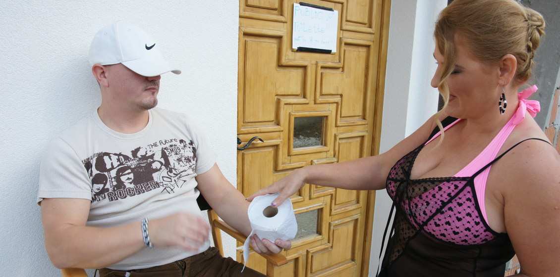 Curvy milf Margitta peeing and fucking at a public bathroom