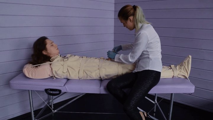 Figging and Foley bladder catheterization into bondage body bag