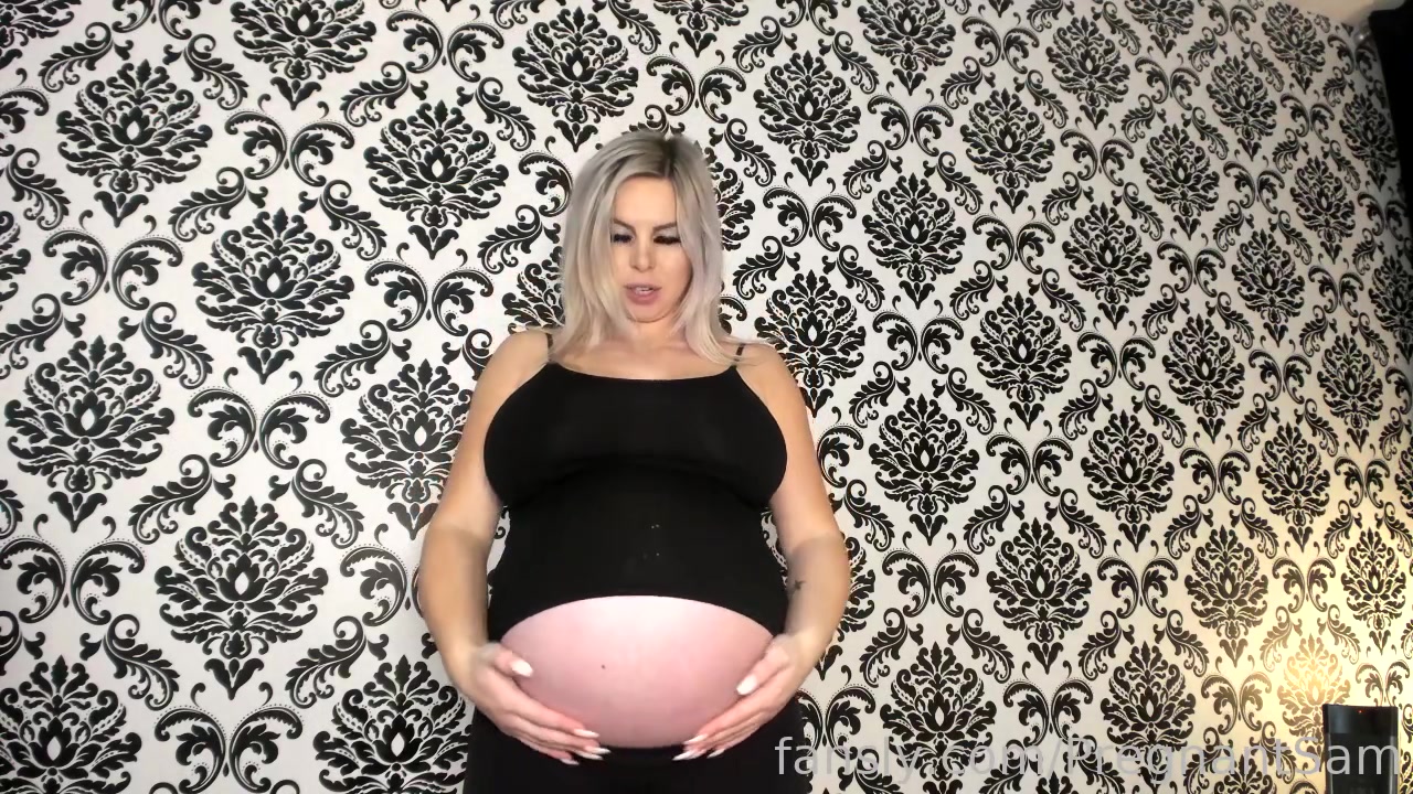 Pregnant trying on tank tops