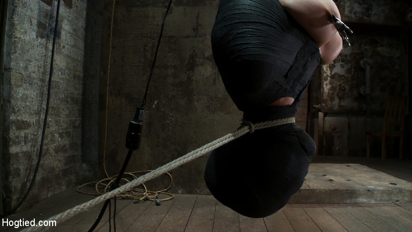 Cute little blond girl is mummified, vibrator stuck on her clit.  Hung upside down to cum & cum.